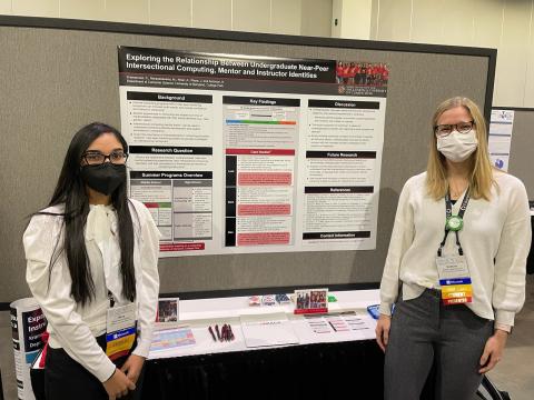 Maya Narayanasamy (left) and Kristina Kramarczuk (right) at SIGSCE 2022.